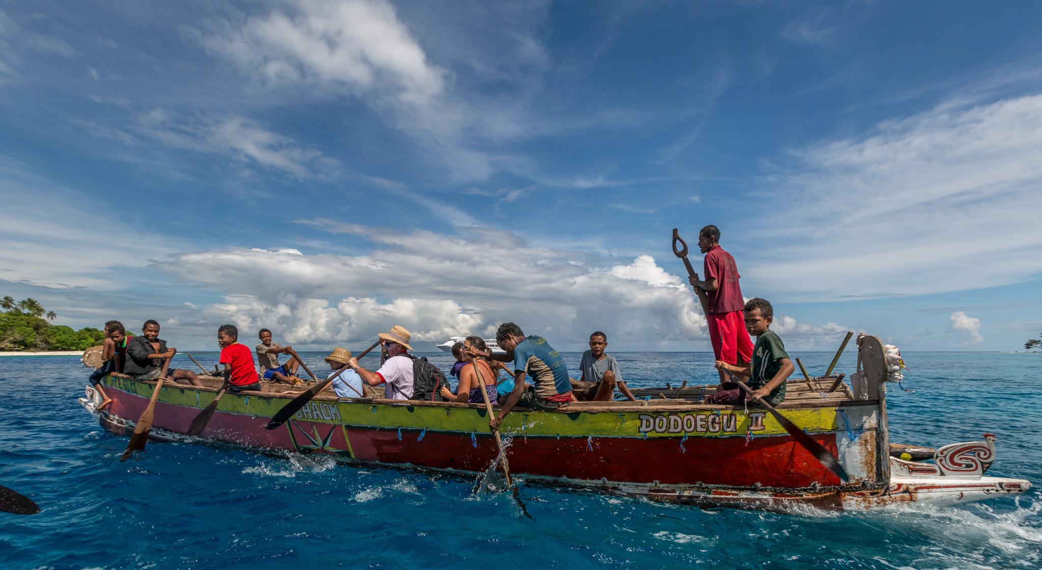 People on a boat in Papua New Guinea