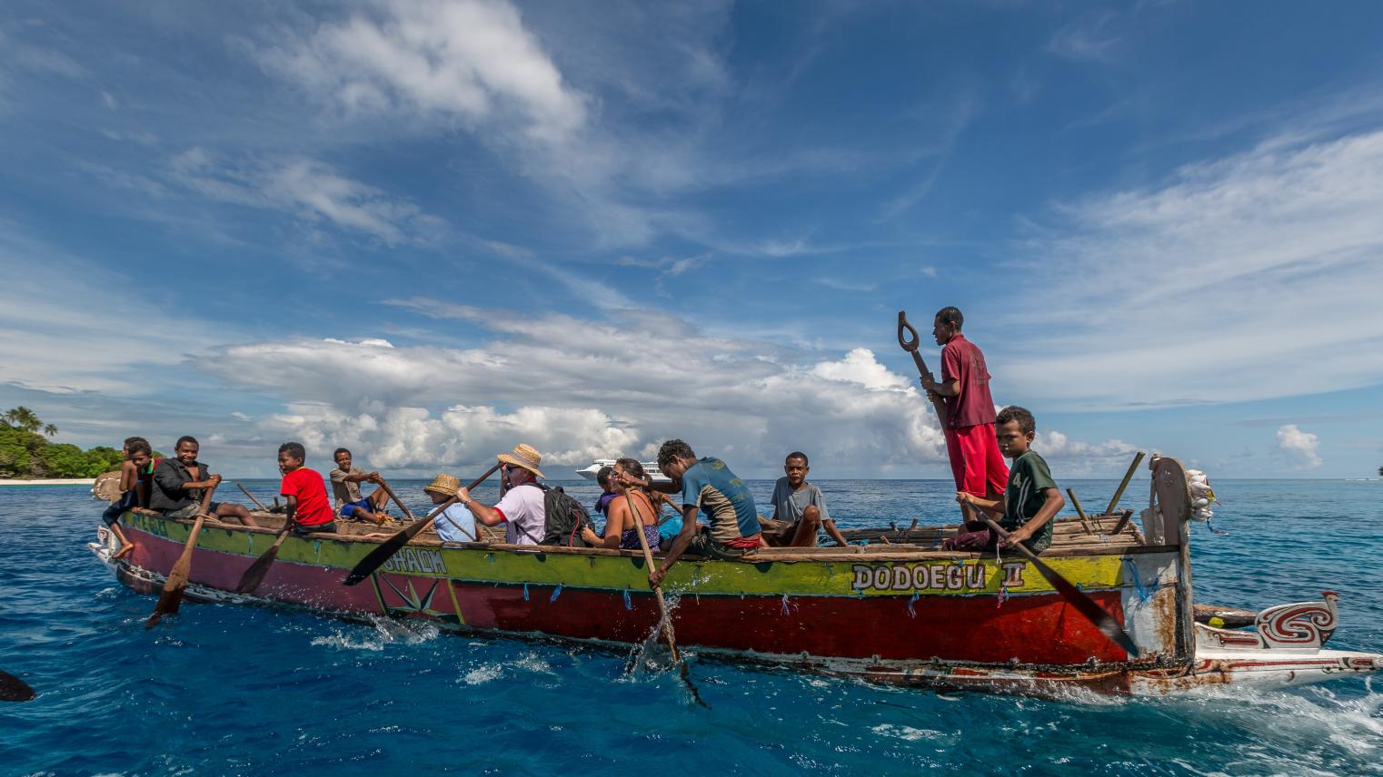 People on a boat in Papua New Guinea
